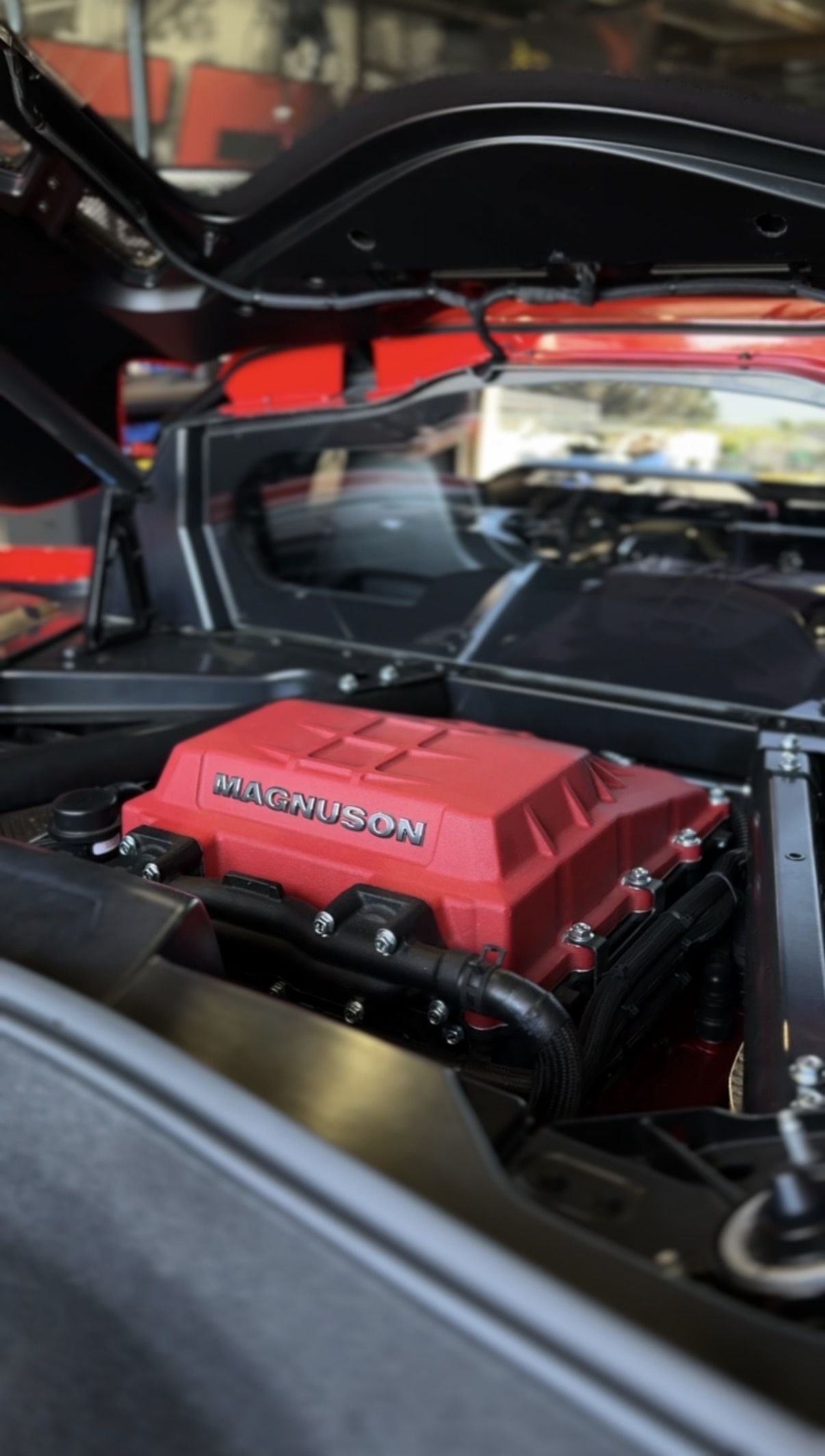 A Magnuson supercharger installed on a C8 Corvette and calibrated by DEFI Motorsports