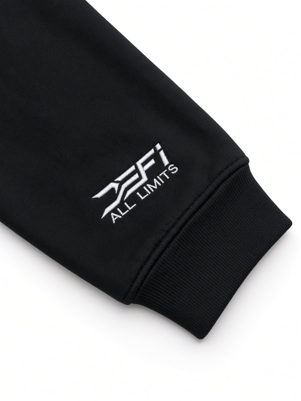 Silver DEFI All Limits print on the cuff of the black DEFI Motorsports hoodie