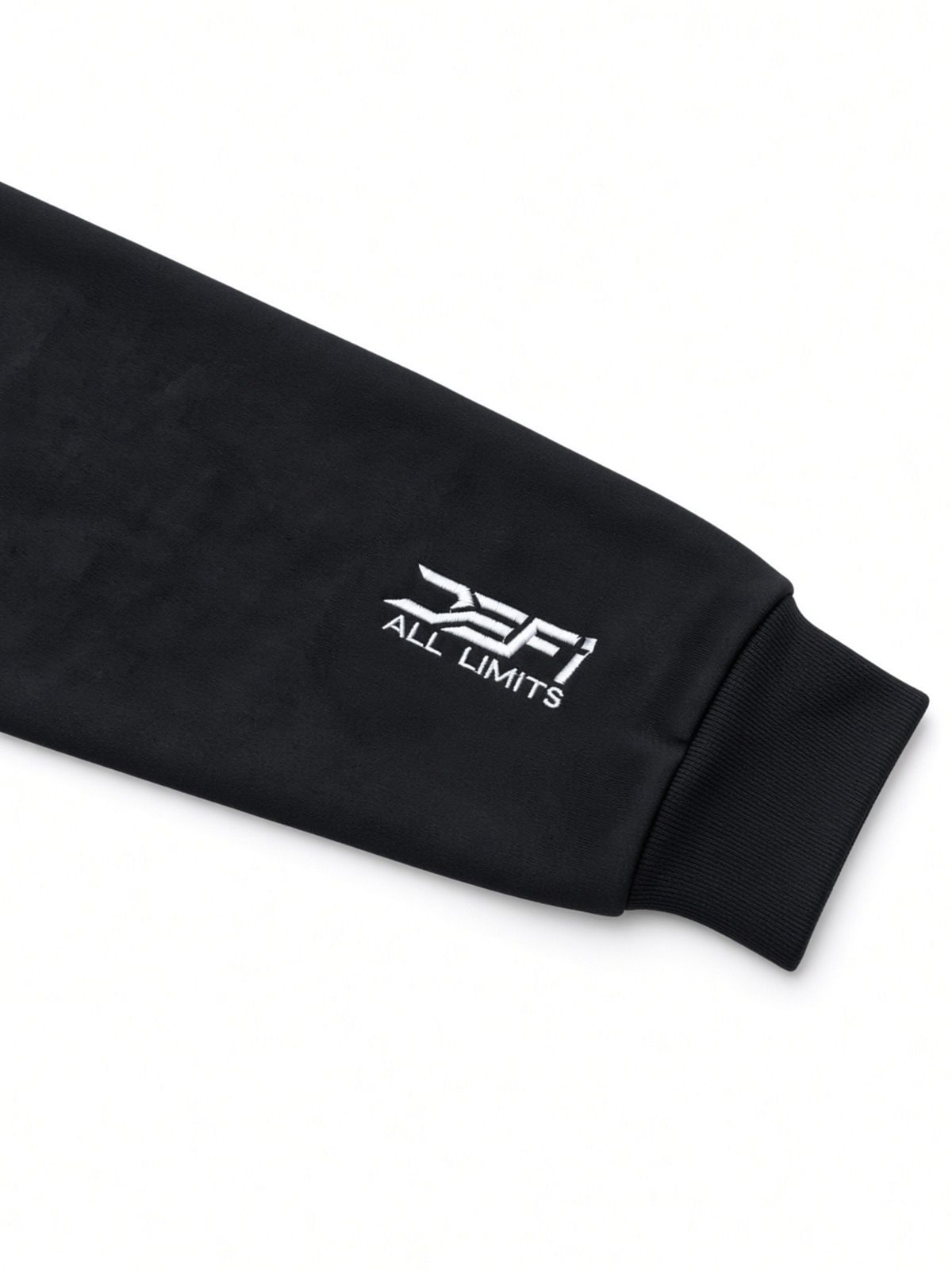 White DEFI All Limits print on the cuff of the black DEFI Motorsports hoodie