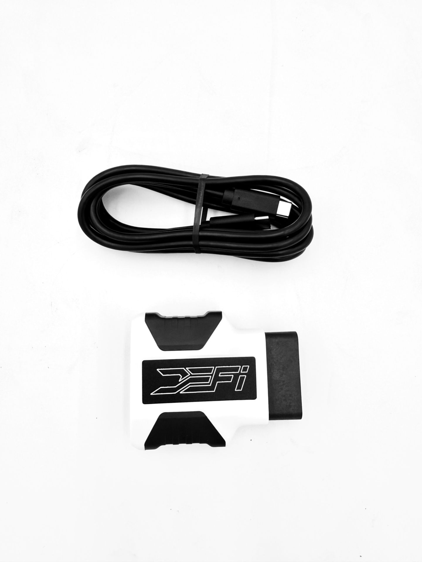 What is in the DEFI Motorsports RTD package: the interface device and its OBDII cable