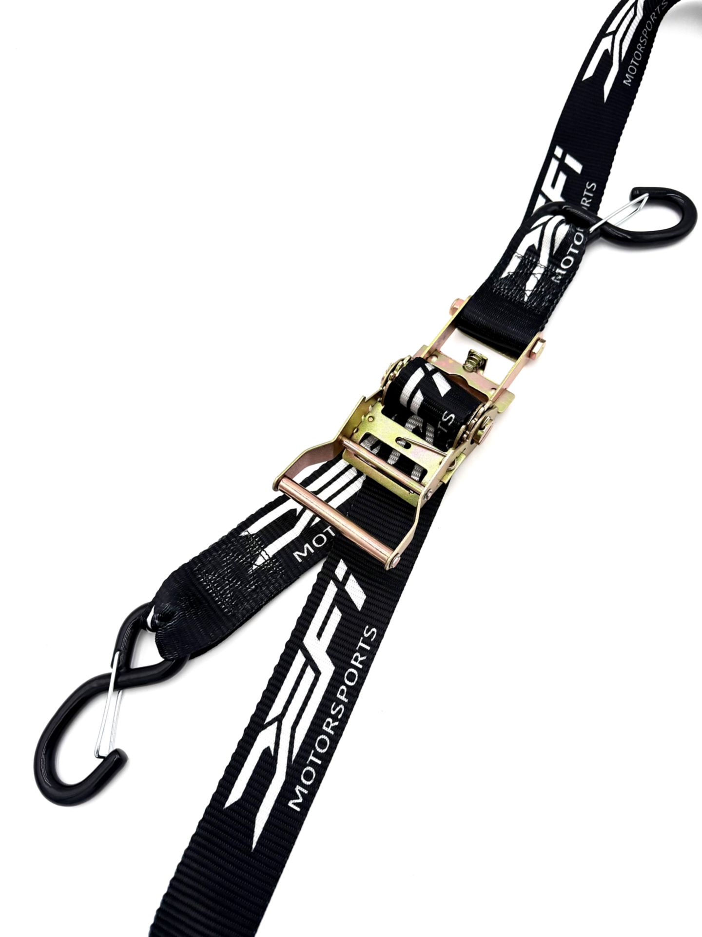 DEFI Motorsports tie-down straps in use securing a vehicle